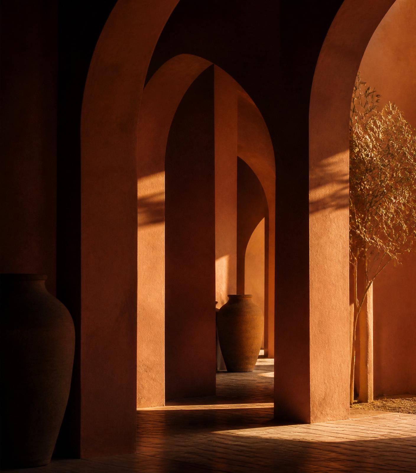 Warm terracotta arches in golden hour light
